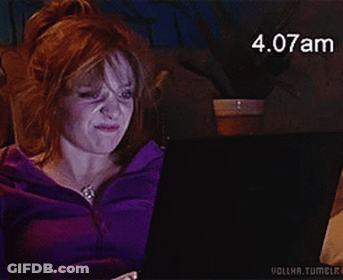 A Woman In A Purple Jacket Is Using A Laptop With The Time 4.08Am GIF