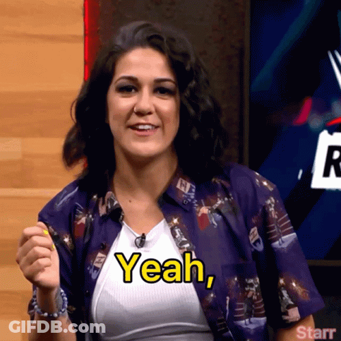 A Woman In A Purple Shirt Says " Yeah " GIF