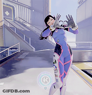 A Woman In A Purple Suit Is Dancing In Front Of A Building With A White Cross On It GIF