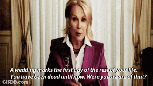 A Woman In A Purple Suit Says " A Wedding Marks The First Day Of The Rest Of Your Life GIF