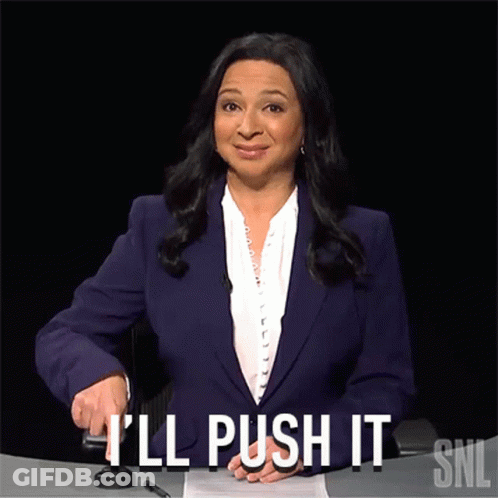 A Woman In A Purple Suit Says I 'Ll Push It Snl GIF