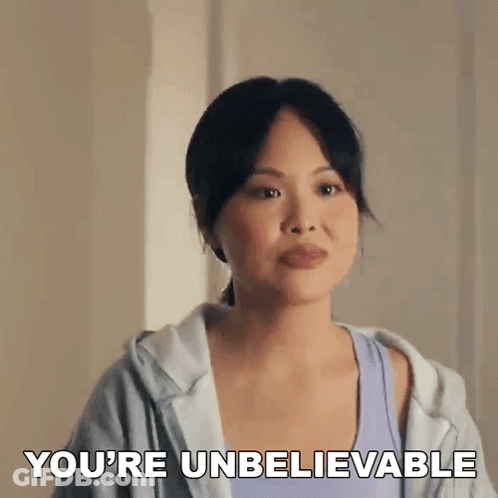 A Woman In A Purple Tank Top Says You 'Re Unbelievable . GIF