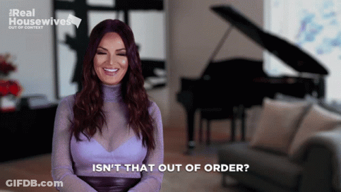 A Woman In A Purple Top Says Isn 'T That Out Of Order GIF