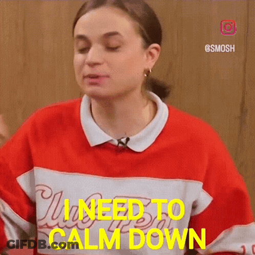 A Woman In A Red And White Shirt Says She Needs To Calm Down . GIF