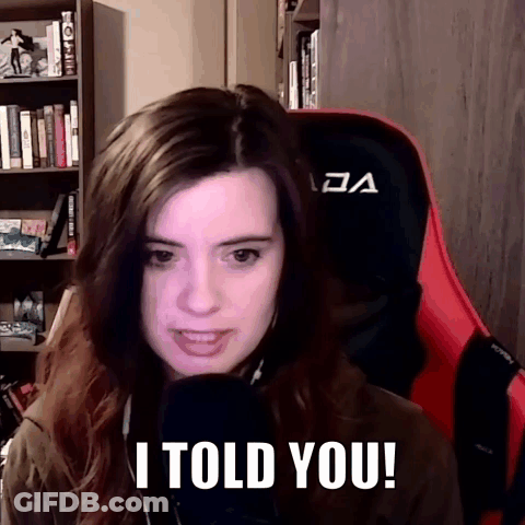A Woman In A Red Chair Says I Told You In Front Of A Microphone GIF