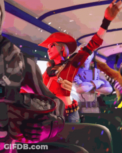 A Woman In A Red Cowboy Hat Is Standing In A Crowd GIF