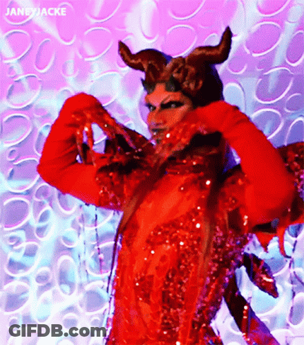 A Woman In A Red Devil Costume Has The Name Janeyjacke At The Bottom GIF