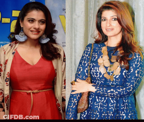 A Woman In A Red Dress And A Woman In A Blue Lace Dress GIF
