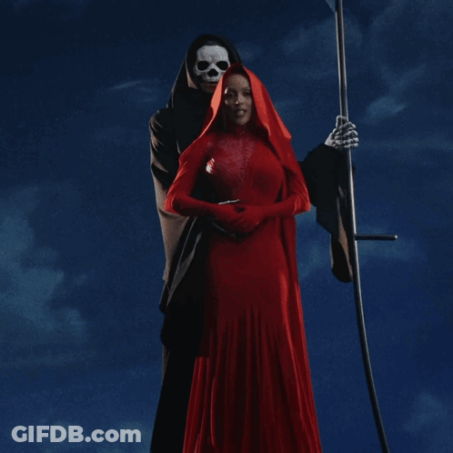 A Woman In A Red Dress Is Being Held By A Grim Reaper GIF