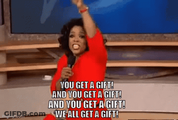 A Woman In A Red Dress Is Holding A Microphone And Saying You Get A Gift GIF