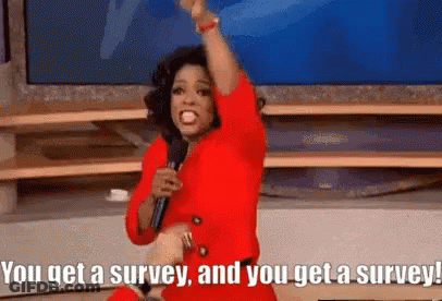A Woman In A Red Dress Is Holding A Microphone And Shouting . GIF