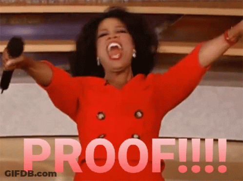 A Woman In A Red Dress Is Holding A Microphone And The Word Proof Is Behind Her GIF