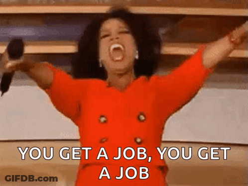A Woman In A Red Dress Is Holding A Microphone With Her Arms In The Air And The Words You Get A Job GIF