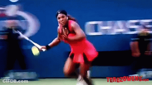A Woman In A Red Dress Is Holding A Tennis Racquet In Front Of A Chase Ad GIF
