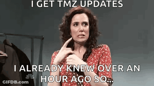 A Woman In A Red Dress Is Making A Funny Face While Holding Her Finger To Her Face . GIF