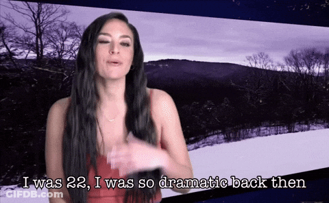 A Woman In A Red Dress Is Saying I Was 22 I Was So Dramatic Back Then GIF