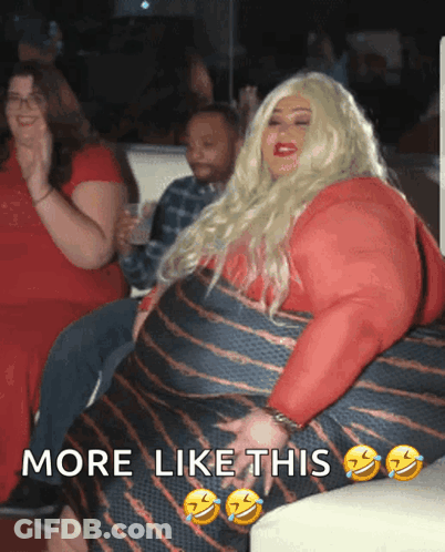 A Woman In A Red Dress Is Sitting On A Couch With The Words More Like This Above Her GIF