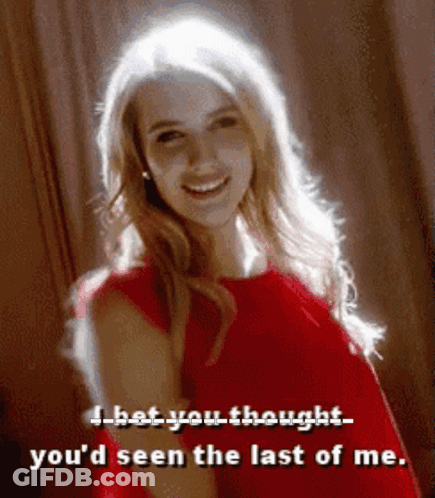 A Woman In A Red Dress Is Smiling And Says I Hat You Thought You 'D Seen The Last Of Me . GIF
