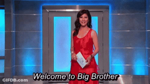 Woman In Red Dress Standing By Blue Door GIF