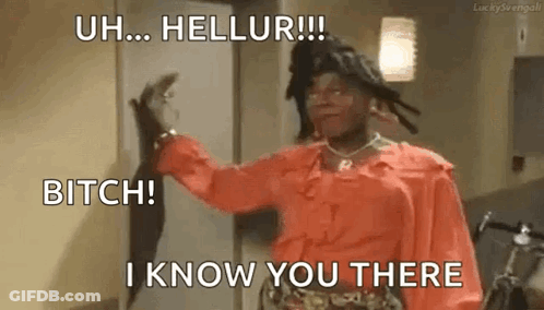 A Woman In A Red Dress Is Standing In Front Of A Door And Holding A Cat . GIF