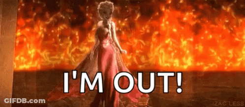 A Woman In A Red Dress Is Standing In Front Of A Fire And The Words `` I 'M Out '' . GIF