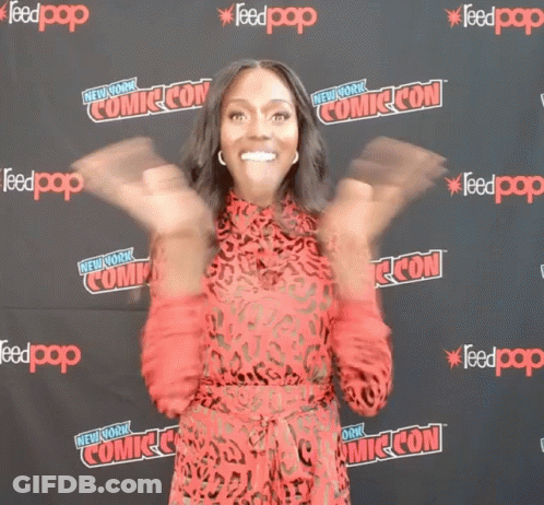 Woman In Red Dress At New York Comic Con GIF