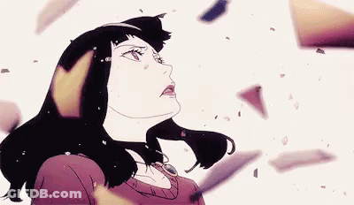 A Woman In A Red Dress Is Standing In Front Of A Pile Of Broken Pieces . GIF