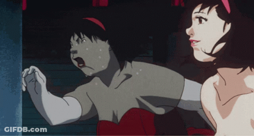 A Woman In A Red Dress Is Standing Next To Another Woman In A White Shirt GIF