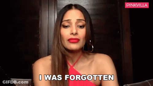A Woman In A Red Dress Is Talking And Says I Was Forgotten . GIF