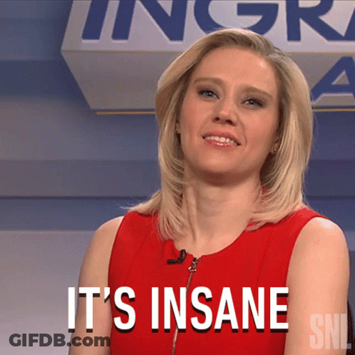 A Woman In A Red Dress Says It 'S Insane On A Sign GIF