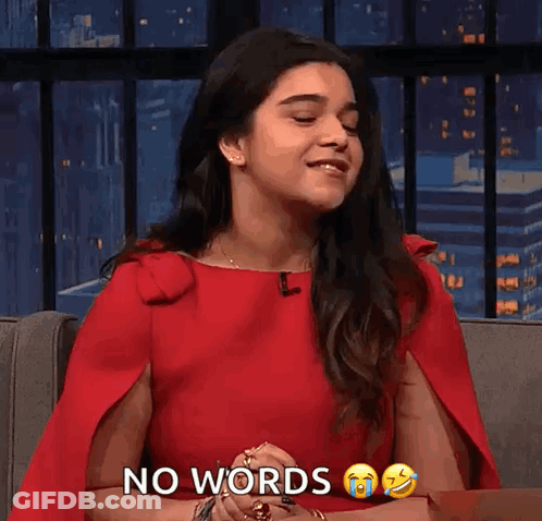 A Woman In A Red Dress Says No Words GIF