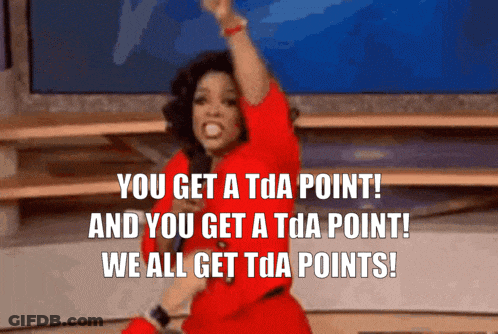 A Woman In A Red Dress Says " You Get A Tda Point " GIF