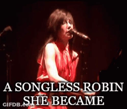 A Woman In A Red Dress Singing Into A Microphone With The Words " A Songless Robin She Became " Below Her GIF
