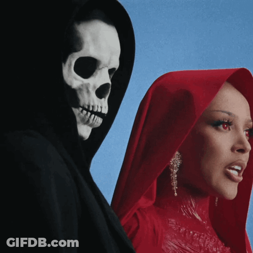 A Woman In A Red Dress Stands Next To A Grim Reaper In A Black Cape GIF