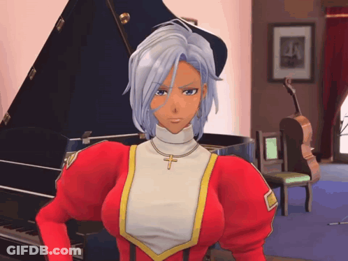 A Woman In A Red Dress With A Cross Around Her Neck Is Standing In Front Of A Piano GIF