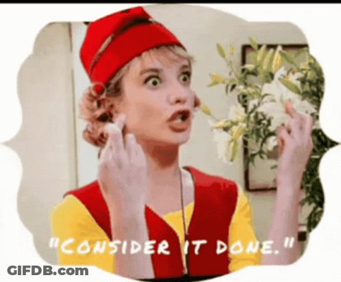 A Woman In A Red Hat Is Holding A White Flower And Says " Consider It Done " GIF