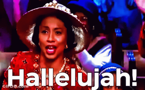A Woman In A Red Hat Sings Hallelujah In Front Of A Crowd GIF