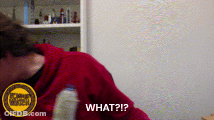 A Woman In A Red Hoodie Is Holding A Bottle And Asking What ? GIF
