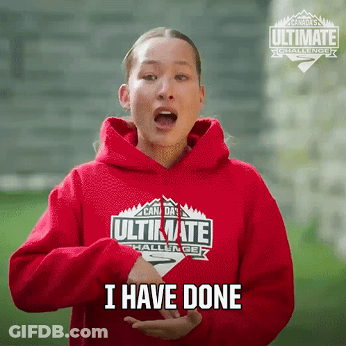 A Woman In A Red Hoodie Says I Have Done In Sign Language GIF