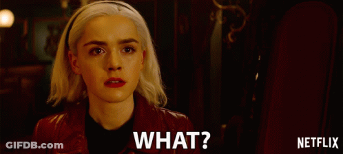 A Woman In A Red Jacket Is Asking The Question What . GIF