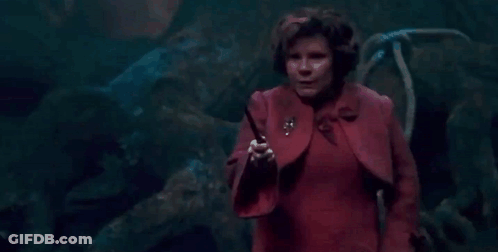 Woman In Red Jacket Holding Wand Authority Must Be Upheld GIF