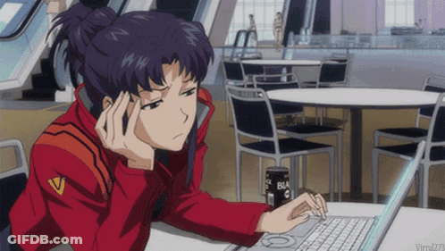 A Woman In A Red Jacket Is Sitting At A Table With A Laptop And A Can Of Black Coffee GIF