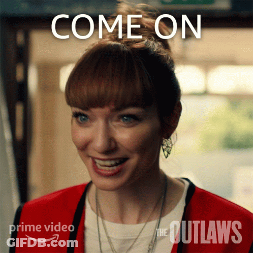 A Woman In A Red Jacket Is Smiling With The Words Come On Behind Her GIF