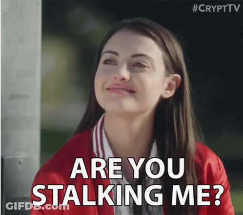 A Woman In A Red Jacket Says " Are You Stalking Me ? " GIF