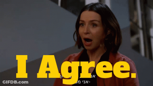 A Woman In A Red Jacket Says I Agree In Yellow GIF