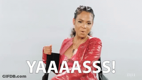 A Woman In A Red Jacket Says Yaaaa Ass On The Screen GIF