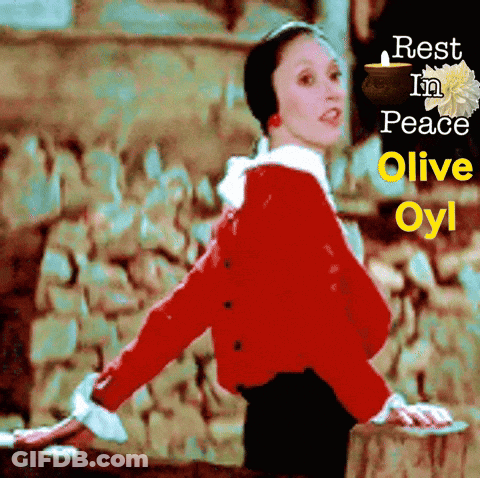 A Woman In A Red Jacket With The Words Rest In Peace Olive Oyl On The Bottom GIF
