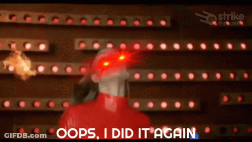 A Woman In A Red Outfit Is Standing In Front Of A Wall With Red Lights And Says Oops I Did It Again . GIF