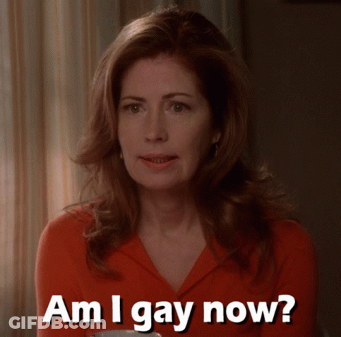 A Woman In A Red Shirt Asks Am I Gay Now GIF