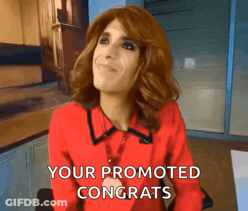 A Woman In A Red Shirt Is Congratulating Someone GIF